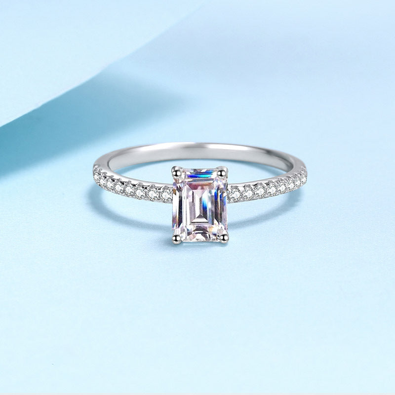 Seraphina Emerald Cut Solitaire Moissanite Ring in Sterling Silver with Platinum Coating