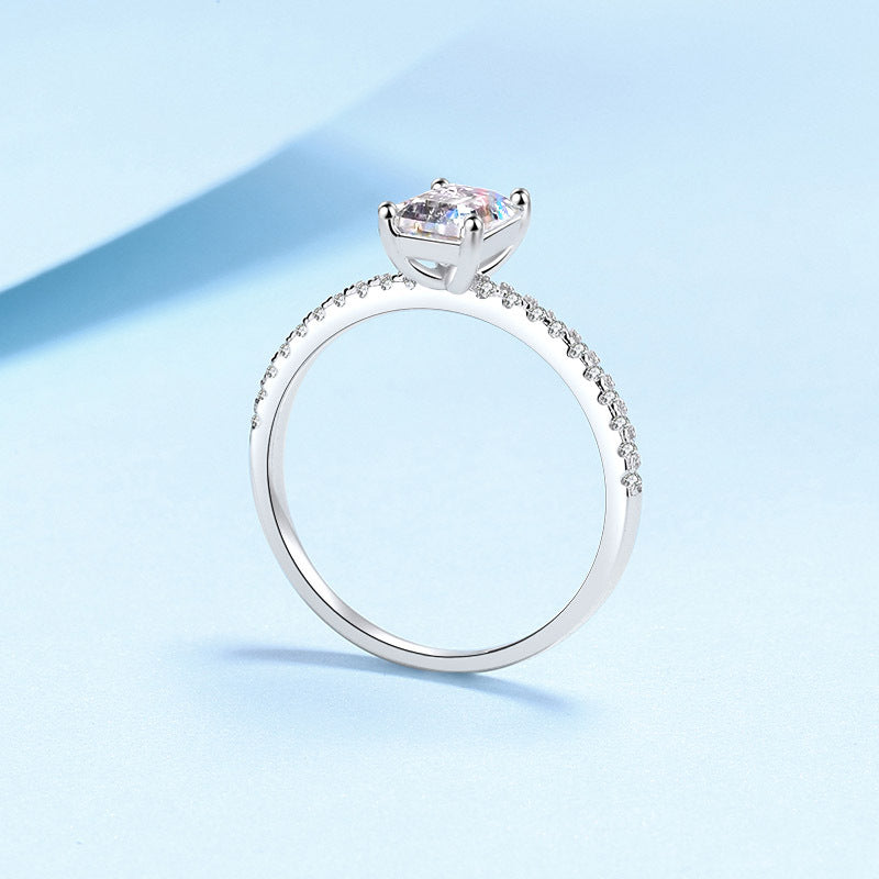 Seraphina Emerald Cut Solitaire Moissanite Ring in Sterling Silver with Platinum Coating