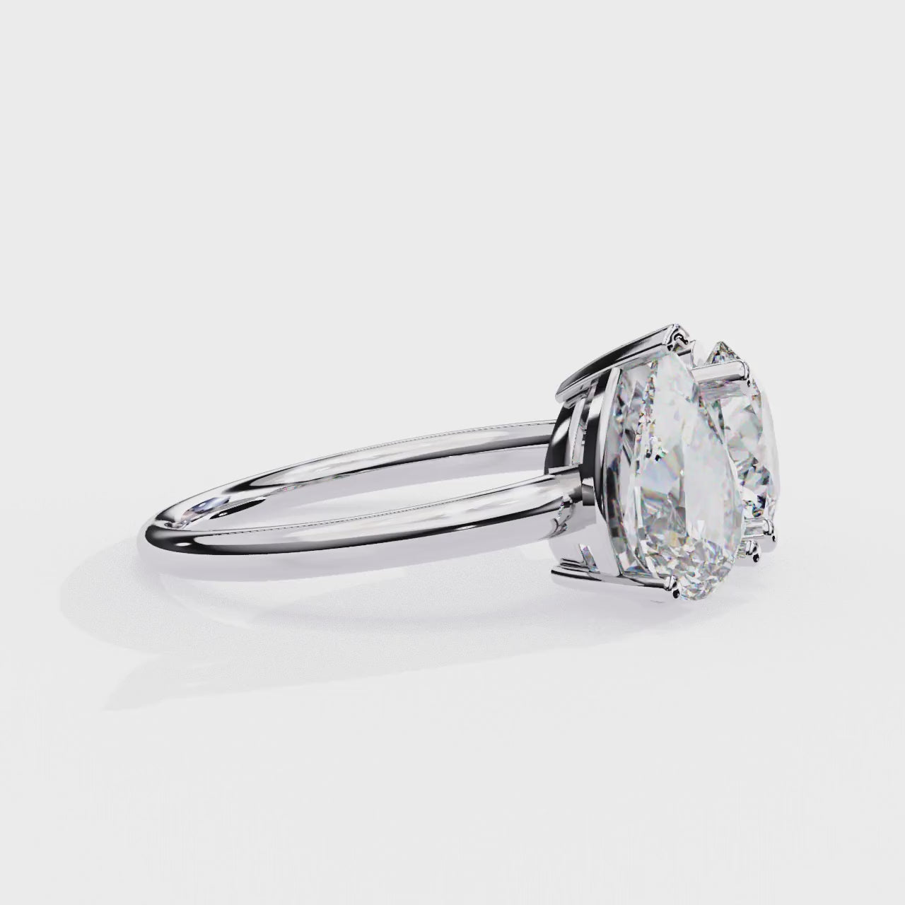 Pear and Round solitaire toi et moi ring
